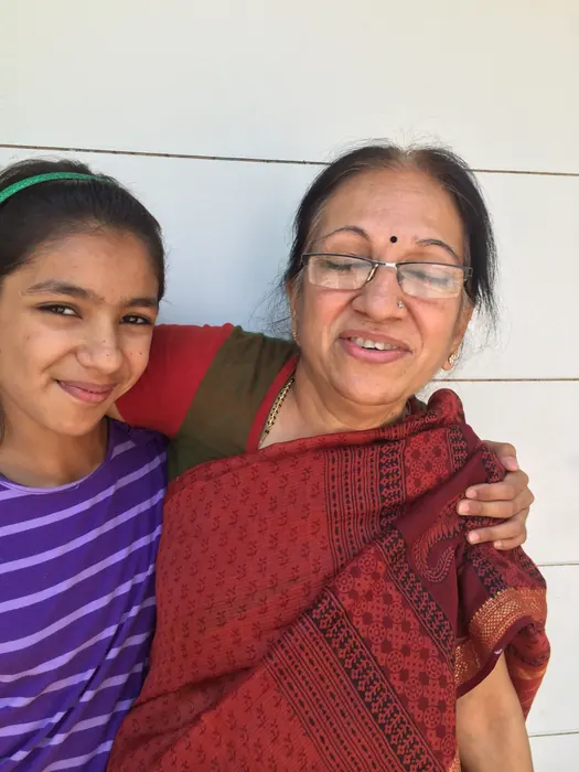 Jaishree Pankaj with her arm around her granddaughter